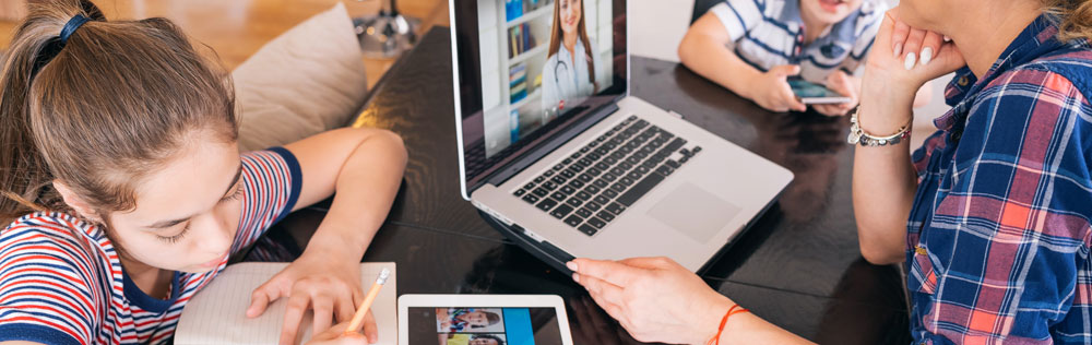 A family using a variety of internet-connected devices